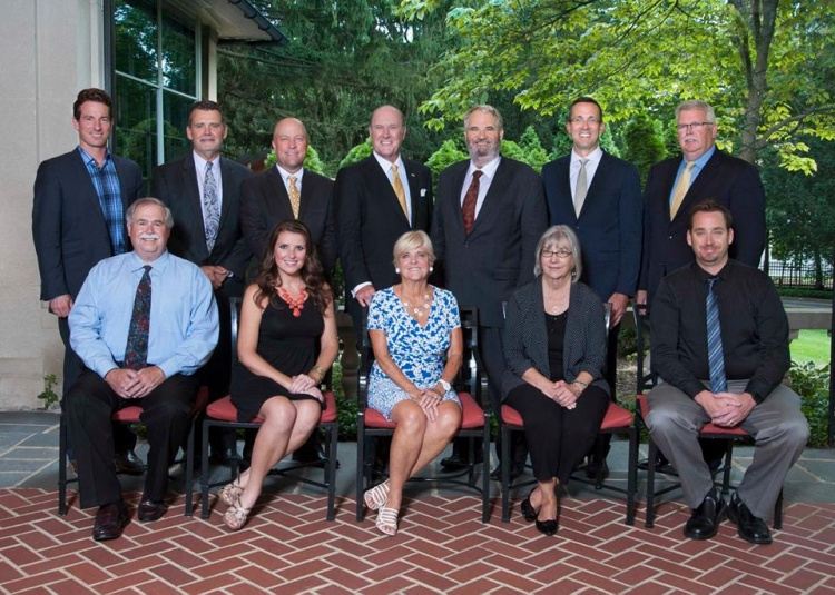 group of business people posing