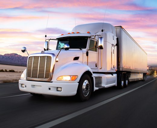 White semi truck driving